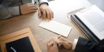 man with resignation letter for quit a job to human resource manager.