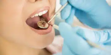 Dentist examining a patient's teeth in the dentist.