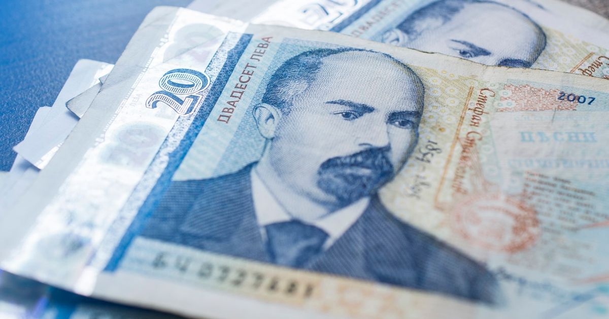 Macro close-up of bulgarian banknotes with different nomination. Bulgarian coins. Български банкноти от 20 лева с портрета на Стефан Стамболов.