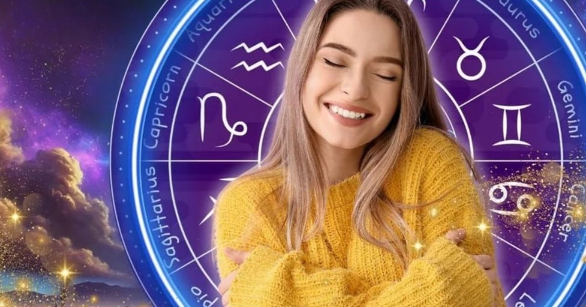 Тези 5 зодии са фаворитите на Вселената през първата половина на 2025 г. Усмихната жена в жълт пуловер пред зодиакален кръг на астрологичен фон.