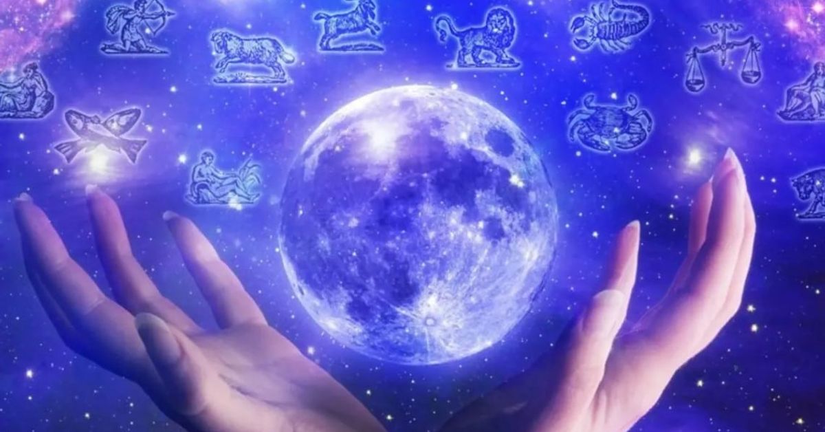Хороскоп за 25 февруари: Овните да избягват конфликтите, а Лъвовете да не забравят за себелюбието Синя луна в ръце, обградена от дванадесетте зодиакални знака в космоса.