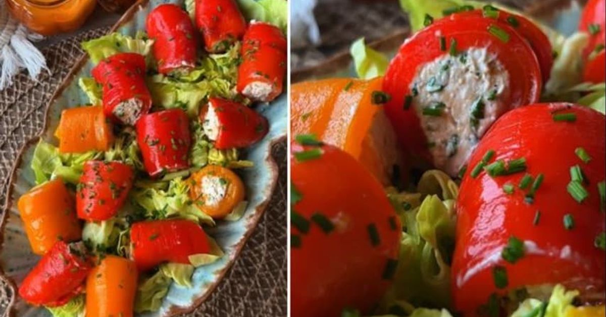 Най-вкусната рецепта за есенно предястие с чушки Пълнени червени и оранжеви чушки с крема сирене и пресни билки върху канапе от маруля.